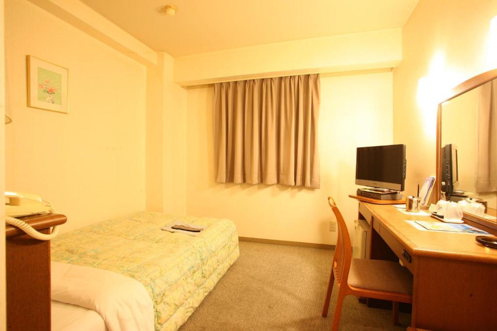 Tendo Central Hotel Room photo