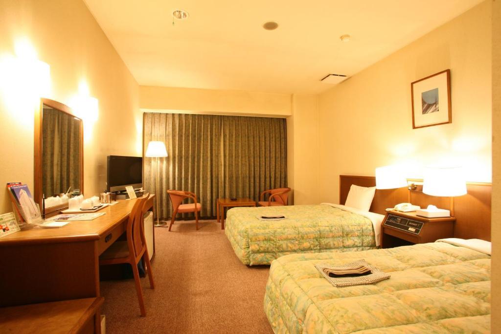 Tendo Central Hotel Room photo